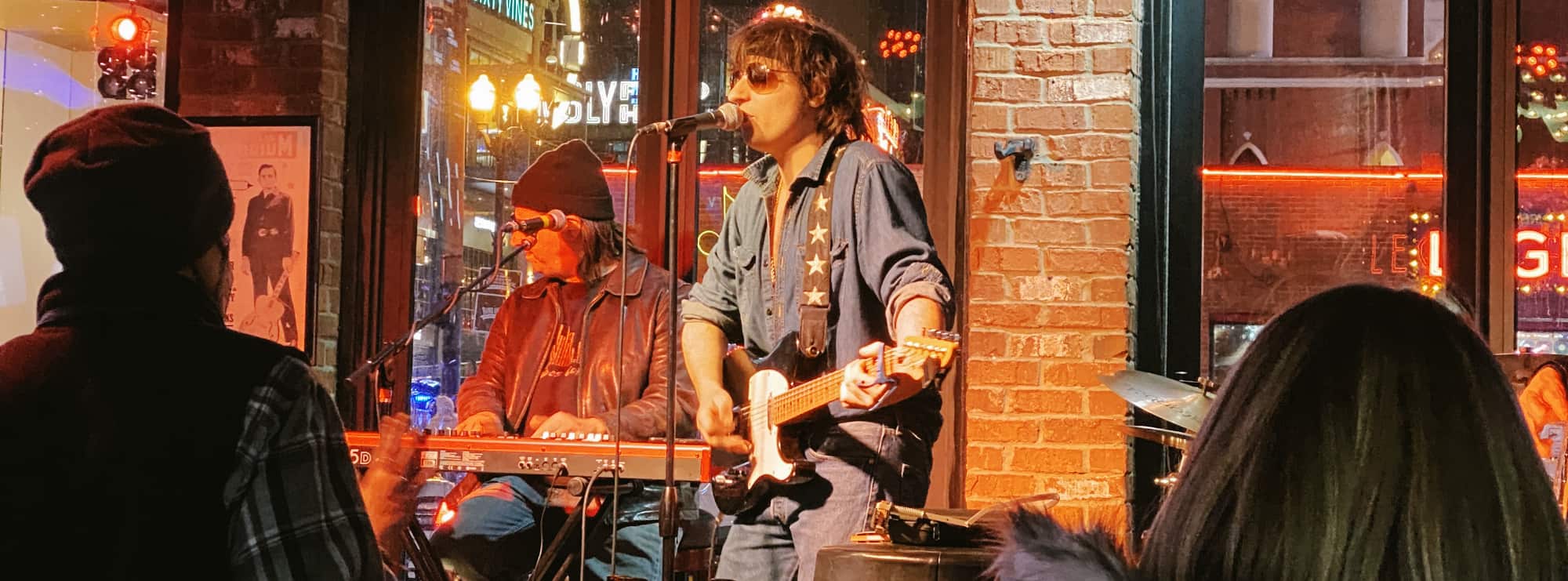 bar singer on guitar in Salt Lake City